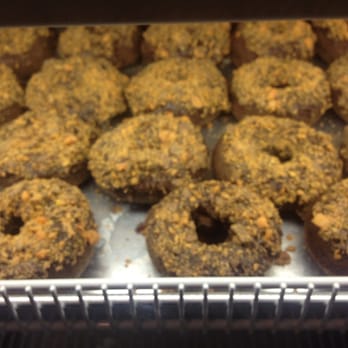 Strange Donuts - Bart's Revenge! Chocolate Cake donut with Chocolate Icing and Butterfinger crumbled on top! - Donuts Near Me - Maplewood, Missouri Strange Donuts - Bart's Revenge! Chocolate Cake donut with Chocolate Icing and Butterfinger crumbled on top! - Donuts Near Me - Maplewood, Missouri