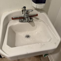 Yogurt Lounge III - Dirt, mold, a filthy squegee and grime in the sink