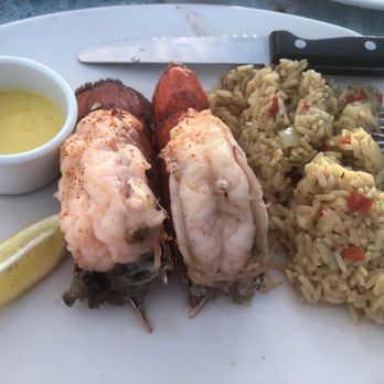 Outback Steakhouse - Two lobster tails with rice - Steakhouses Near Me - Palmdale, California Outback Steakhouse - Two lobster tails with rice - Steakhouses Near Me - Palmdale, California