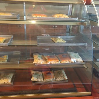 Mysore Darshini - a display case with various foods - Indian Near Me - Mississauga, Ontario