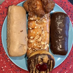 Papa's Donuts - Apple fritter, chocolate and maple bar, Bearclaw, and PBJ doughnuts.