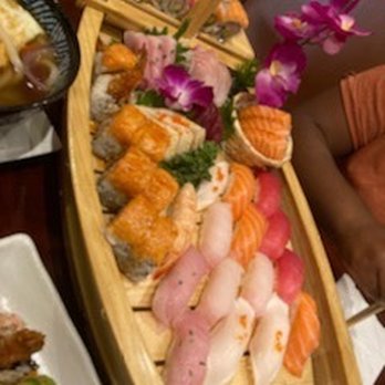 Yama Sushi Bar - Yama Love Boat + Rainbow Roll + Sunset Roll - Sushi Bars Near Me - Baltimore, Maryland Yama Sushi Bar - Yama Love Boat + Rainbow Roll + Sunset Roll - Sushi Bars Near Me - Baltimore, Maryland