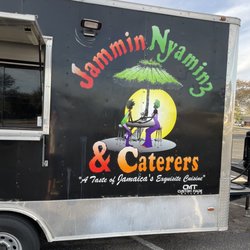 Jammin Nyaminz - Their sign on the side of the food truck to look for!