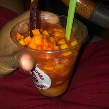 La Michoacana Universal - Mangoniada ice cream with mango bits and chamoy and tamarindo stick - Ice Cream & Frozen Yogurt Near Me - Santa Ana, California