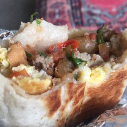 BEST BREAKFAST BURRITO I HAVE HAD IN YEARS. Flakey tortilla, perfect melted cheese , eggs, veggies, sausage. Veggie was also an option BEST BREAKFAST BURRITO I HAVE HAD IN YEARS. Flakey tortilla, perfect melted cheese , eggs, veggies, sausage. Veggie was also an option