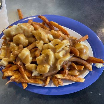 Chez Vachon - a plate of french fries and gravy - Breakfast & Brunch Near Me - Manchester, New Hampshire