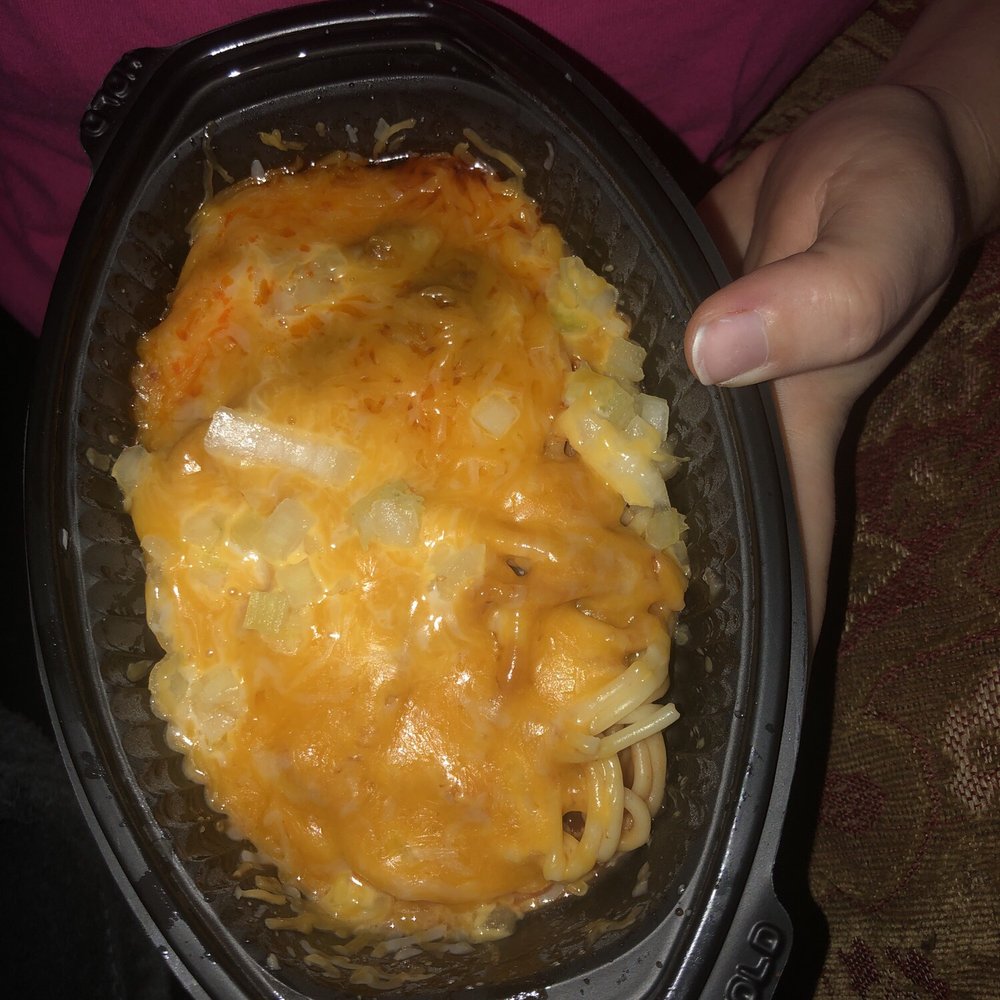  a person holding a casserole
