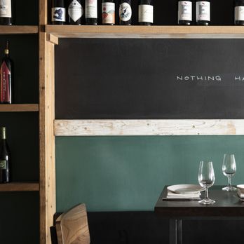 Niu Wine - a table with wine glasses on it - Wine Bars Near Me - Miami, Florida Niu Wine - a table with wine glasses on it - Wine Bars Near Me - Miami, Florida