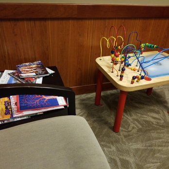 Jason Kim, MD, FACS - Magazines and little kids playing table - Ear Nose & Throat Near Me