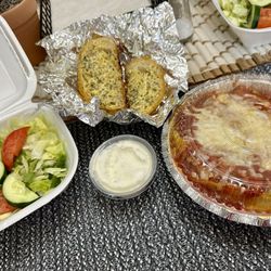 Nonno’s Kitchen & Grill - Lasagna with side salad and garlic bread