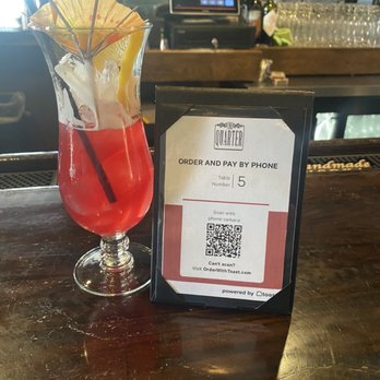 The Quarter - Hurricane and how to order.  Yes, you get a full glass, I couldn't help myself before I took the pic :-) - Bars Near Me - Indianapolis, Indiana