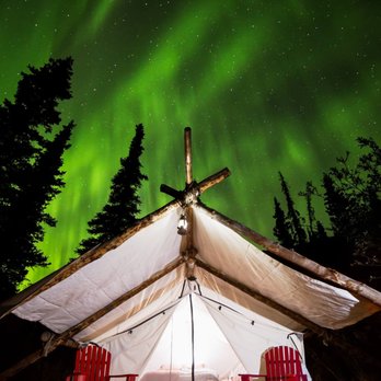 Alpenglow Luxury Camping - The northern lights dancing over one of Alpenglow's Luxury tents in late season. Photo by David Crane - Bed & Breakfast Near Me - Glacier View, Alaska Alpenglow Luxury Camping - The northern lights dancing over one of Alpenglow's Luxury tents in late season. Photo by David Crane - Bed & Breakfast Near Me - Glacier View, Alaska