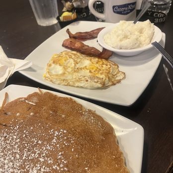 CanopyRoad Cafe - pancake, grits, eggs and bacon. lemon water & earl grey tea - Breakfast & Brunch Near Me - Tampa, Florida CanopyRoad Cafe - pancake, grits, eggs and bacon. lemon water & earl grey tea - Breakfast & Brunch Near Me - Tampa, Florida