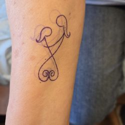 Tattoo City Skin Art Studio art by Larry Brogan