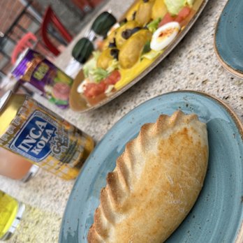Copacabana Cafe - Papa a la huancaina and saltena - Spanish Near Me - Seattle, Washington