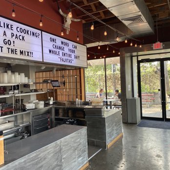 Fajitas A Go Go - a kitchen with a large screen - Tex-Mex Near Me - Houston, Texas