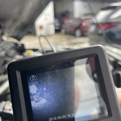 Car Care of Jupiter - Diagnosing internal engine issues without disassembly with our advanced diagnostic equipment.