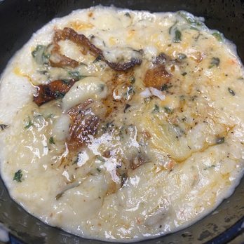 Trindy Gourmet - Smothered fish and grits - Breakfast & Brunch Near Me - West Palm Beach, Florida