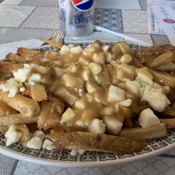 Cartrites - a plate of french fries covered in gravy - Breakfast & Brunch Near Me - Shawville, Quebec Cartrites - a plate of french fries covered in gravy - Breakfast & Brunch Near Me - Shawville, Quebec