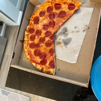 Troni Brothers Pizza - a half eaten pepperoni pizza - Pizza Near Me - Kettering, Ohio Troni Brothers Pizza - a half eaten pepperoni pizza - Pizza Near Me - Kettering, Ohio