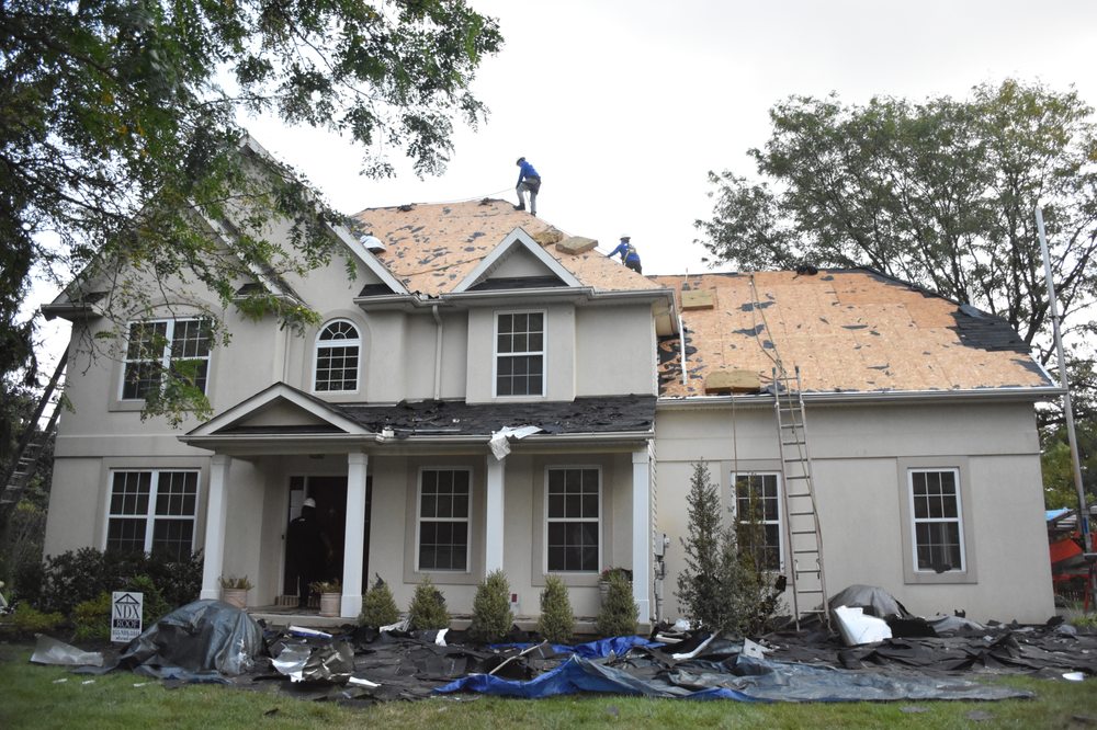 Slide of NDX Roofing and Restoration