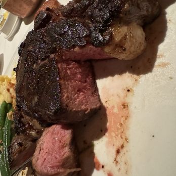 T-Bones - Bone Bone-In Ribeye* cooked to perfection medium rare. Pan-Seared Scallops* on the side were so delish also. - Steakhouses Near Me - Las Vegas, Nevada