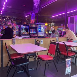 Air Hockey....Auntie wins cuz she's a cheater!! Air Hockey....Auntie wins cuz she's a cheater!!