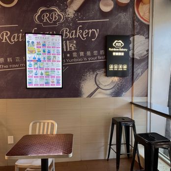 Woodside Rainbow Bakery - tables and chairs in front of a window - Bubble Tea Near Me - Woodside, New York Woodside Rainbow Bakery - tables and chairs in front of a window - Bubble Tea Near Me - Woodside, New York