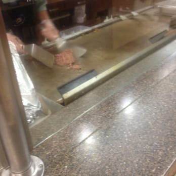 Original Sub Cafe - Working the steak for my sandwich - Cafes Near Me - Davie, Florida Original Sub Cafe - Working the steak for my sandwich - Cafes Near Me - Davie, Florida