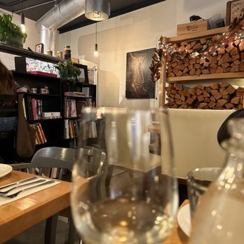 In Bocca Al Lupo - White wine and decor - Italian Near Me - Juneau, Alaska In Bocca Al Lupo - White wine and decor - Italian Near Me - Juneau, Alaska
