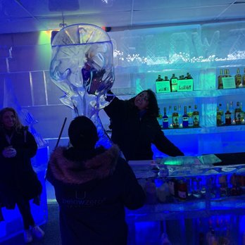 Below Zero Ice Bar - Bartender pouring shot - Bars Near Me - Queenstown, OTA