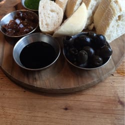 Olio And Farino - Olives, balsamic vinegar, pesto and bread.