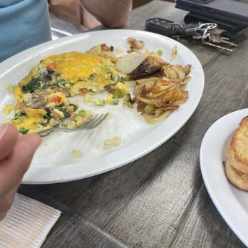 Breakfast Shack - What's left of husband's omelette. - Breakfast & Brunch Near Me - Redlands, California Breakfast Shack - What's left of husband's omelette. - Breakfast & Brunch Near Me - Redlands, California