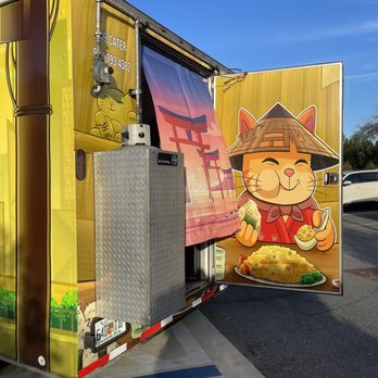 Dorami - a delivery truck with a cartoon cat on the side - Food Trucks Near Me Dorami - a delivery truck with a cartoon cat on the side - Food Trucks Near Me