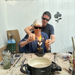 Tsunami's Glass Shop - Ben and Joy making a glass rose