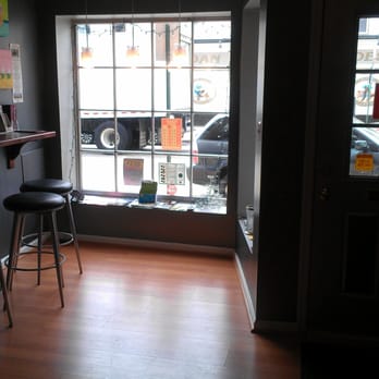 Midnite Confection's Cupcakery - Small seating section front of the store - Bakeries Near Me - Baltimore, Maryland
