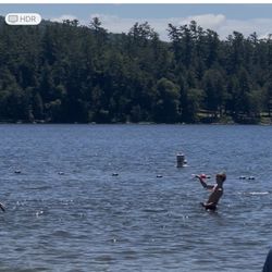 Schroon Lake - This is a red haired lifeguard that just threw a ball to his lifeguard friend.