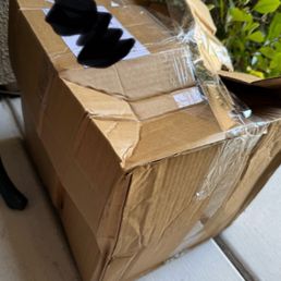 I'm pretty sure this box never made it in the truck - driver just dragged it behind!