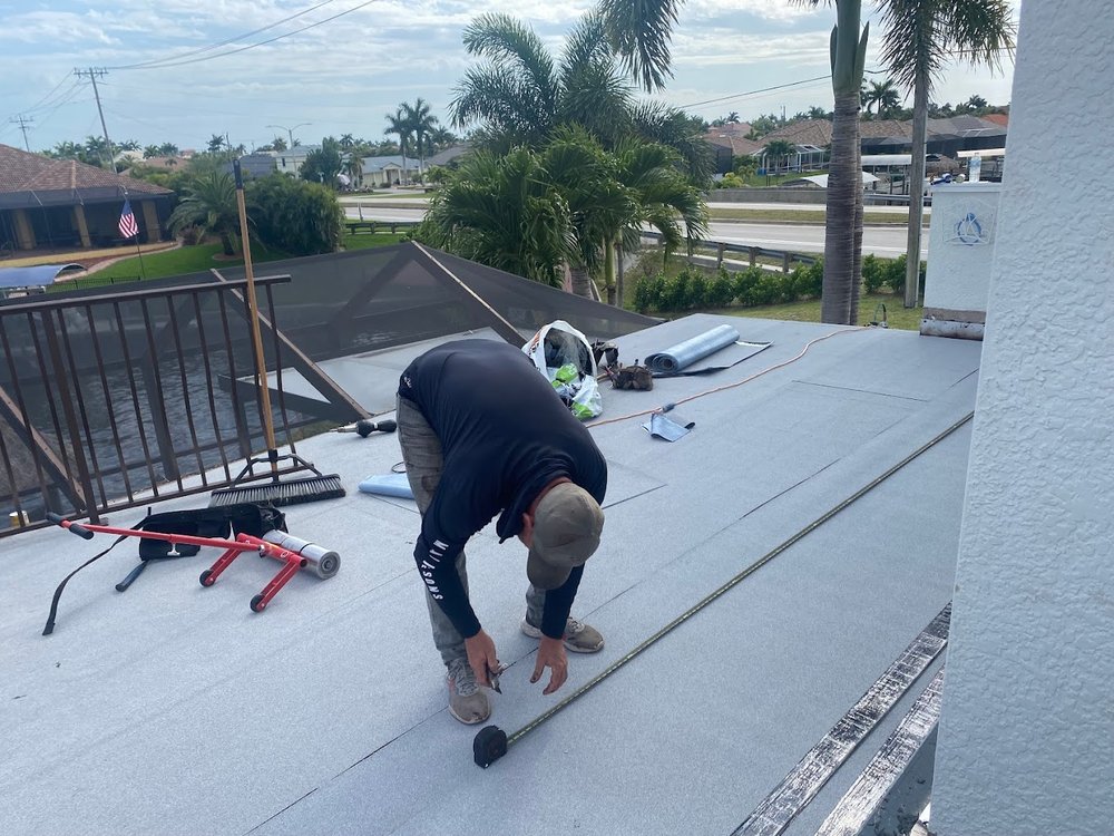 Slide of Whitby Roofing