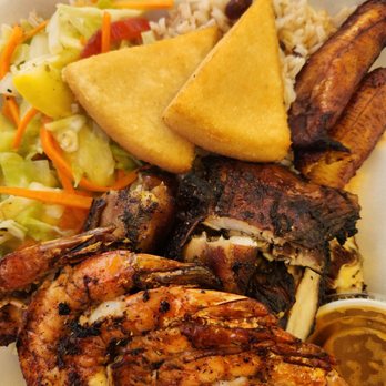 One Love - Jerk chicken dinner with coconut rice & beans, cabbage & sweet plantain. I ordered a side of jerk butter shrimp skrewer. - Food Trucks Near Me - Key West, Florida One Love - Jerk chicken dinner with coconut rice & beans, cabbage & sweet plantain. I ordered a side of jerk butter shrimp skrewer. - Food Trucks Near Me - Key West, Florida