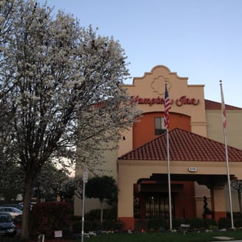 Hampton Inn Milpitas - Lilac trees in bloom, in front of the lobby - Hotels Near Me - Milpitas, California Hampton Inn Milpitas - Lilac trees in bloom, in front of the lobby - Hotels Near Me - Milpitas, California