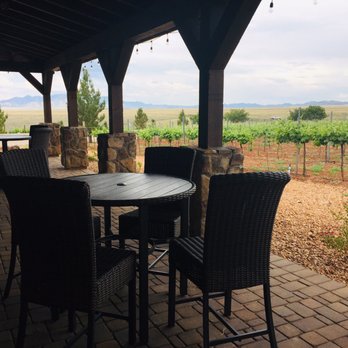 Autumn Sage Vineyards - Seating area by the grapes. - Wine Tasting Room Near Me - Elgin, Arizona Autumn Sage Vineyards - Seating area by the grapes. - Wine Tasting Room Near Me - Elgin, Arizona