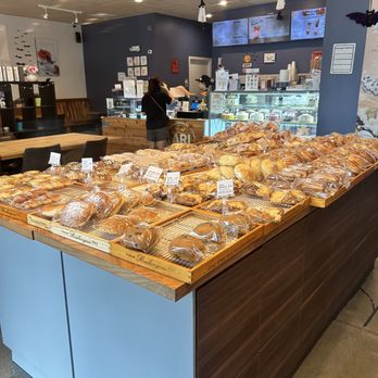Ari Bakery Cafe - Table with breads - Bakeries Near Me - Davie, Florida