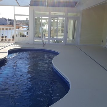 Able Pools and Spas - A Sundial in a enclosure in Compass Pointe - Hot Tub & Pool Near Me - Wilmington, North Carolina