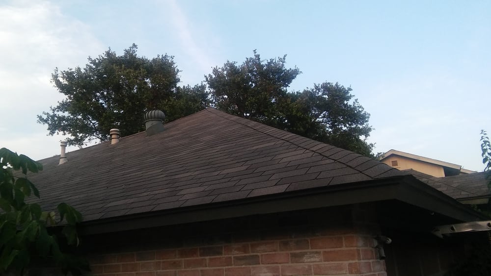 Slide of Twin Brothers Roofing