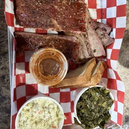Ribs, brisket, collards, cole slaw Ribs, brisket, collards, cole slaw