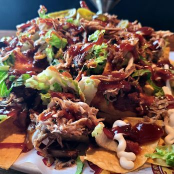 Chicho’s - CHICHO's - Cho's Nachos (1/2 serving, w/ Pulled Pork) - Pizza Near Me - Virginia Beach, Virginia Chicho’s - CHICHO's - Cho's Nachos (1/2 serving, w/ Pulled Pork) - Pizza Near Me - Virginia Beach, Virginia