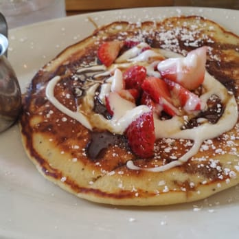 Eats - So Happy pancakes, contains zesty lemon flavor with poppy seed topped with strawberries - American Near Me - San Francisco, California
