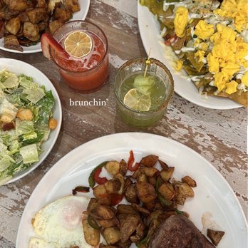 Toast Kitchen & Bar - Steak and eggs Chilaquiles  side of  Country Potatoes Strawberry & cucumber Margarita - Breakfast & Brunch Near Me - Brea, California