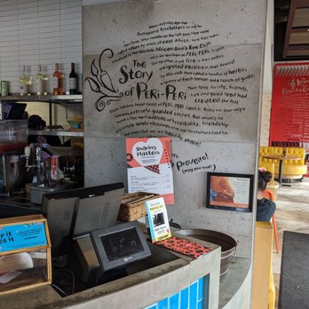 Nando's Peri-Peri - Payment area and the story of PERi-PERi - Portuguese Near Me - Richmond Hill, Ontario Nando's Peri-Peri - Payment area and the story of PERi-PERi - Portuguese Near Me - Richmond Hill, Ontario